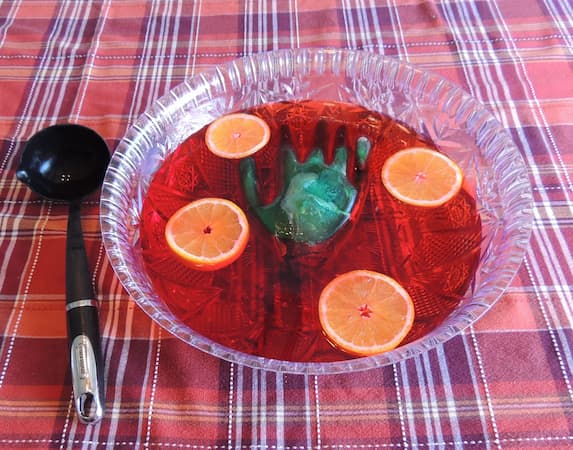 Witch's Brew Party Punch. Frozen Witches Hand Recipe